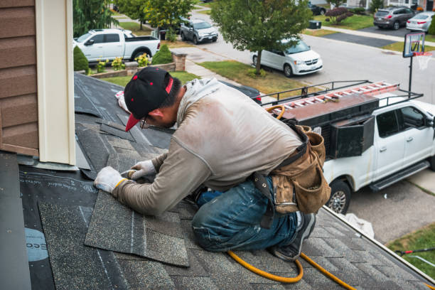 Professional Roofing technician working in Maynard, MA